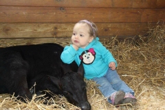 child-resting-on-calf